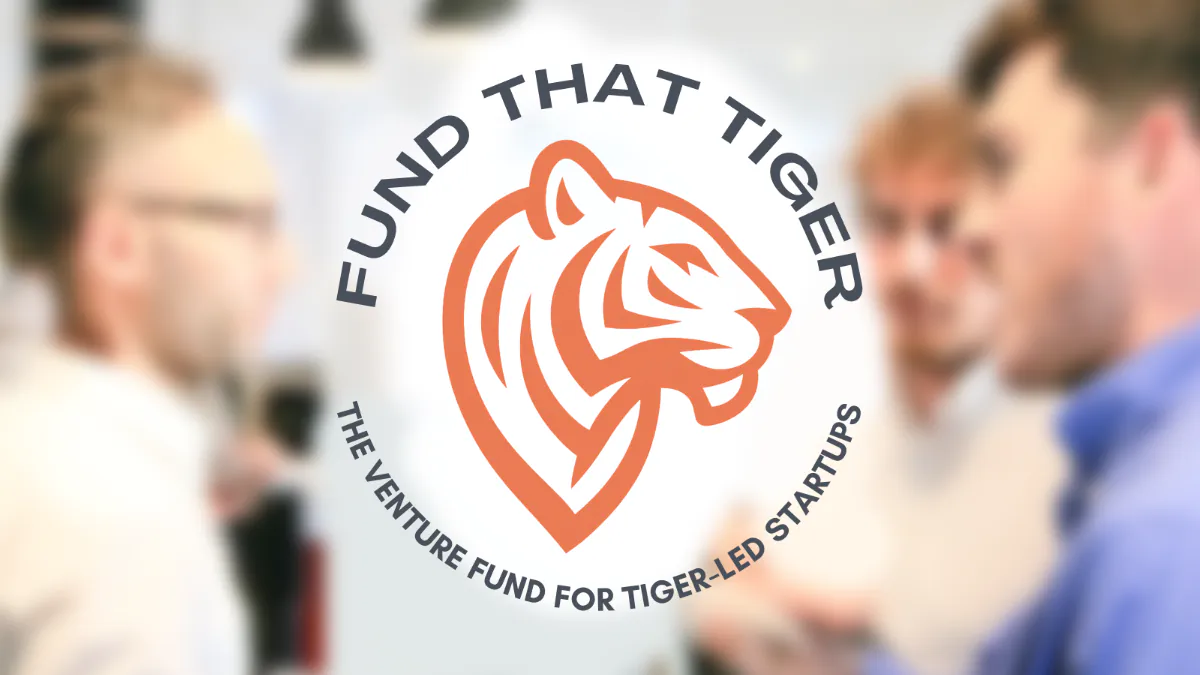 Fund That Tiger logo over a blurred image of a few founders talking to each other