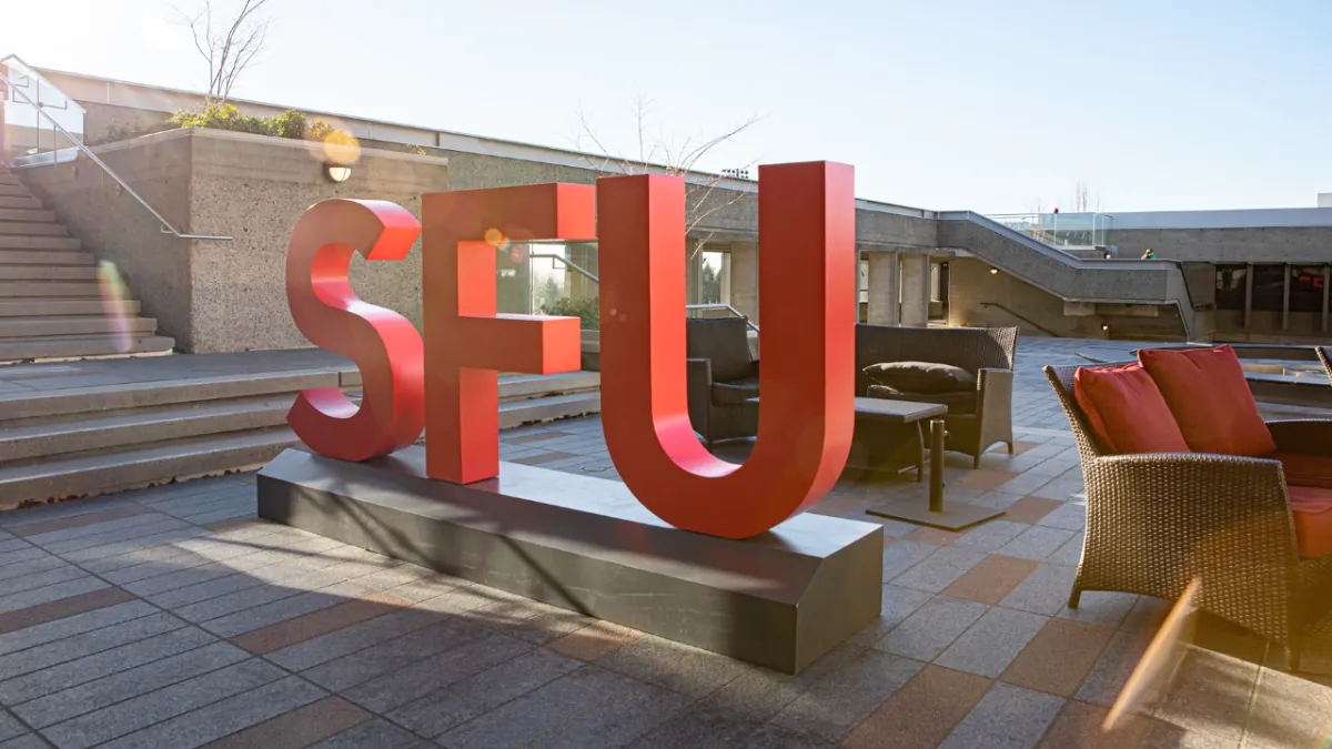a statue of massive SFU letters in red